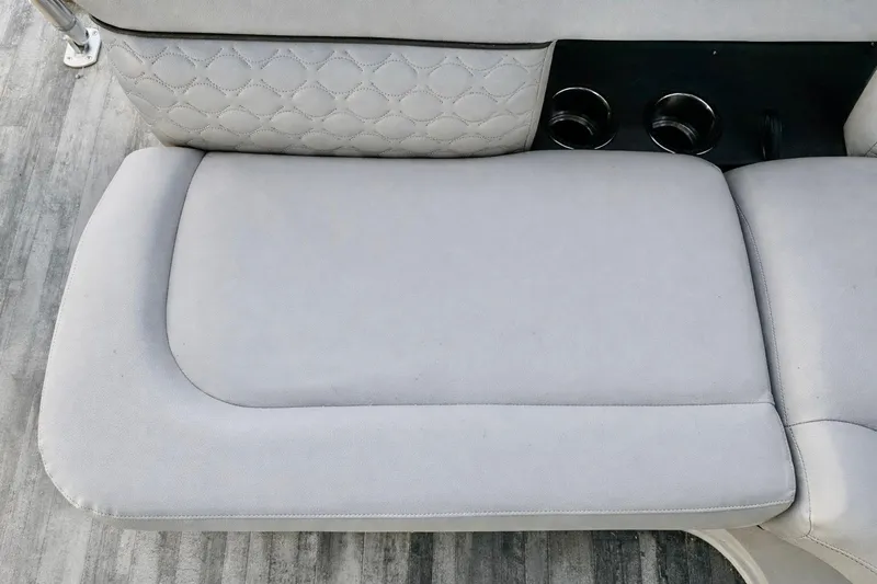 Slide: The Image of Crest 250 LUSD 2019 boat seat with quilted pattern and cup holders. - 8