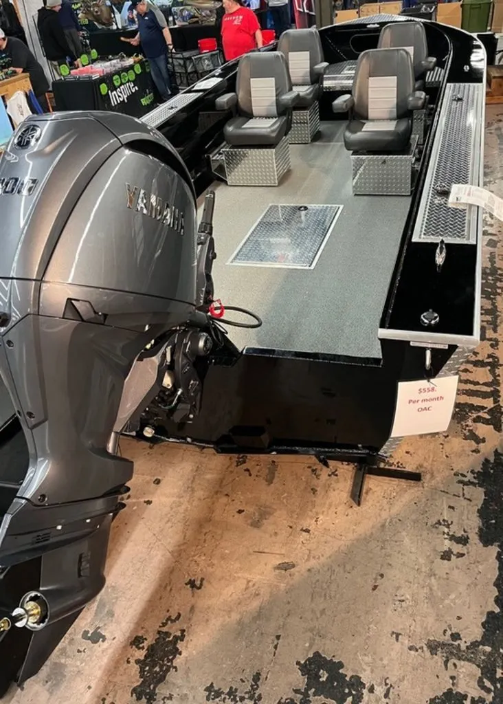 Slide: The Image of 2026 RH Boats 23 Commander with Yamaha engine, interior view. - 4