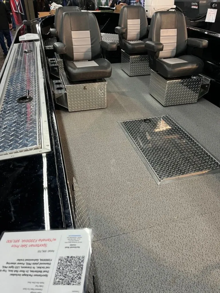 Slide: The Image of Interior of RH Boats 23 Commander 2026 with cushioned seats. - 5