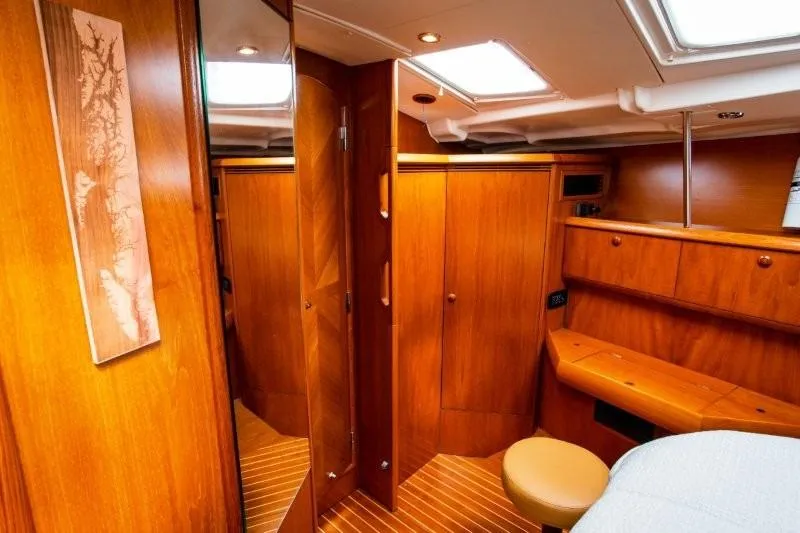 Slide: The Image of Interior of 2007 Jeanneau Sun Odyssey 54 DS yacht with wooden cabinetry and seating. - 10