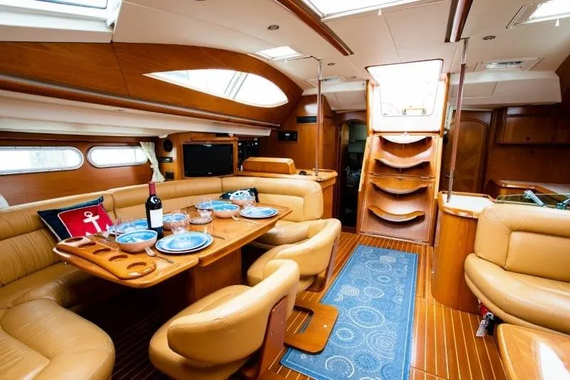 Slide: The Image of Luxurious interior of 2007 Jeanneau Sun Odyssey 54 DS yacht with elegant dining area. - 5