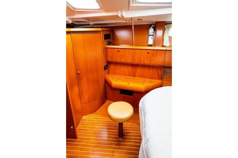 Slide: The Image of Interior of 2007 Jeanneau Sun Odyssey 54 DS yacht with wooden cabinetry and seating. - 9