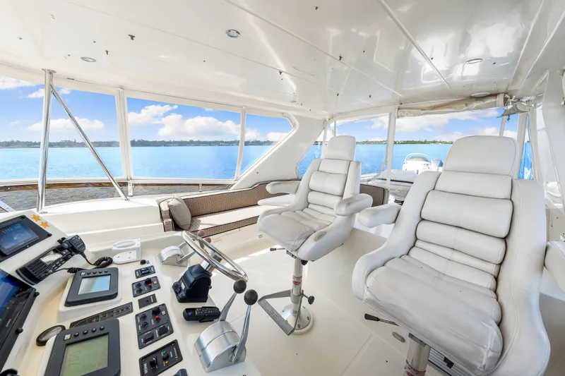 Slide: The Image of Luxurious 2007 Hampton 558 Pilothouse interior with plush seating and panoramic ocean views. - 45