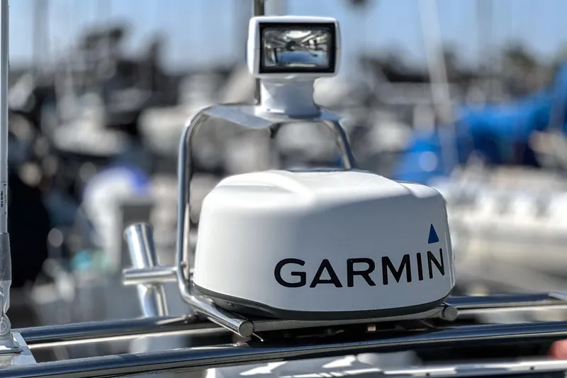 Slide: The Image of Garmin radar on 2019 Axopar 28 CABIN boat, marina background. - 44