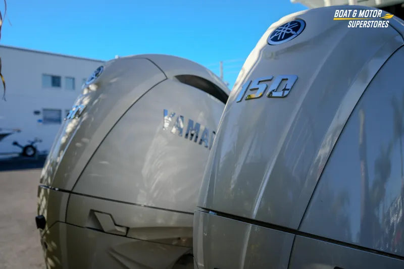 Slide: The Image of Yamaha 150 outboard motors on a 2026 Key West 260 Center Console boat. - 19