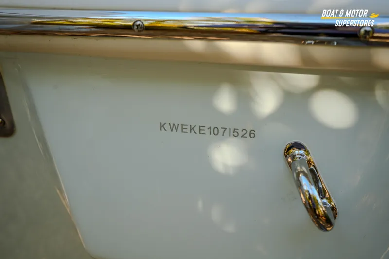 Slide: The Image of 2026 Key West 260 Center Console boat with visible serial number and chrome details. - 21