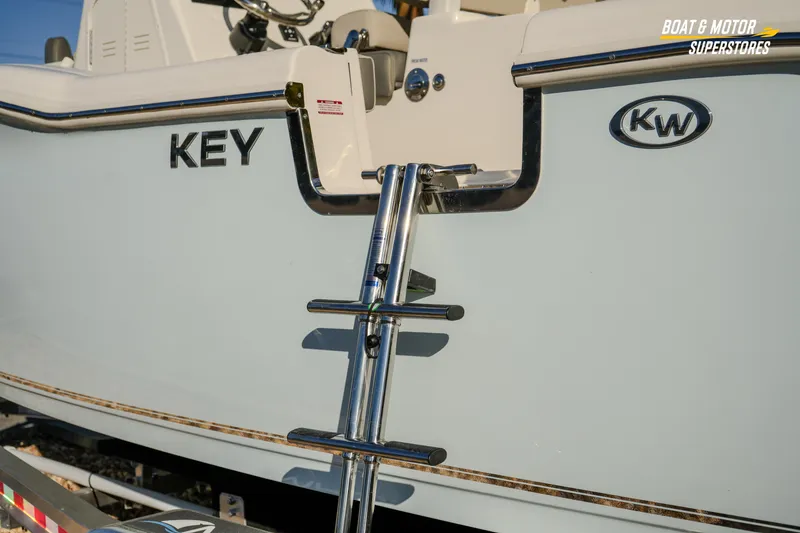 Slide: The Image of 2026 Key West 260 Center Console boat with ladder and KW logo. - 31