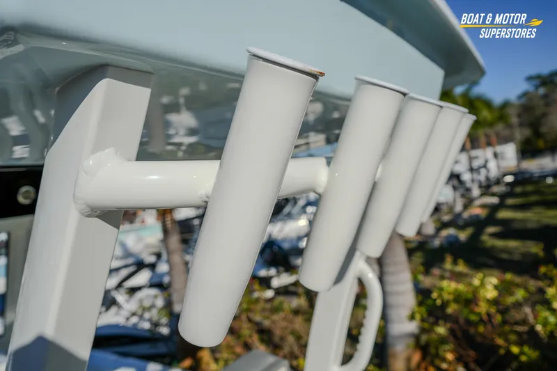 Slide: The Image of Rod holders on a 2026 Key West 260 Center Console boat, displayed outdoors. - 33