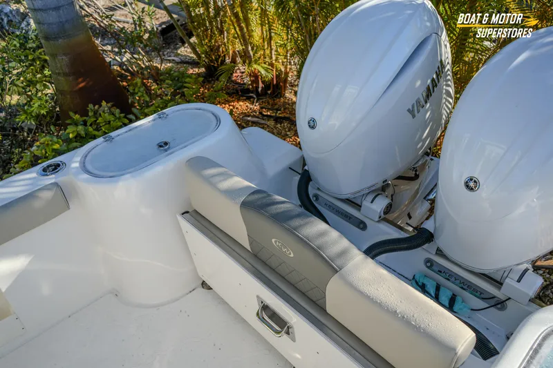 Slide: The Image of 2026 Key West 260 Center Console with dual Yamaha engines, outdoor setting. - 34