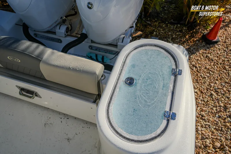 Slide: The Image of 2026 Key West 260 Center Console boat with dual engines and cushioned seating. - 35