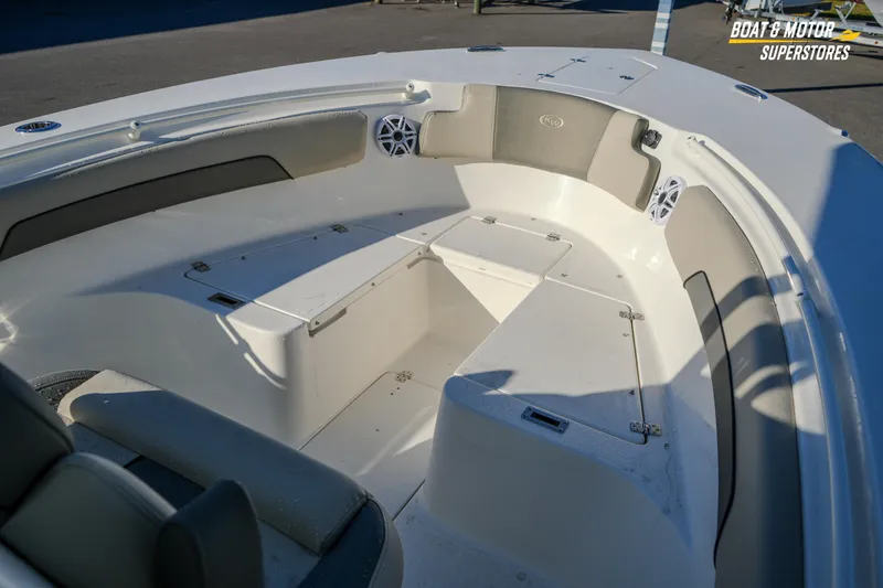 Slide: The Image of 2026 Key West 260 Center Console boat interior with seating and storage compartments. - 41