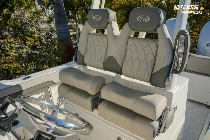 Slide: The Image of 2026 Key West 260 Center Console boat seats with diamond stitching and KW logo. - 42