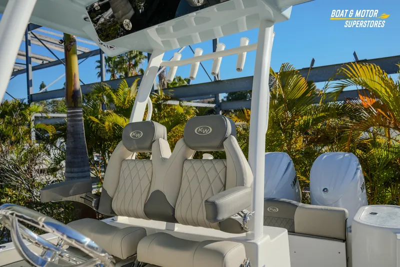 Slide: The Image of 2026 Key West 260 Center Console boat interior with dual seats and steering wheel. - 44
