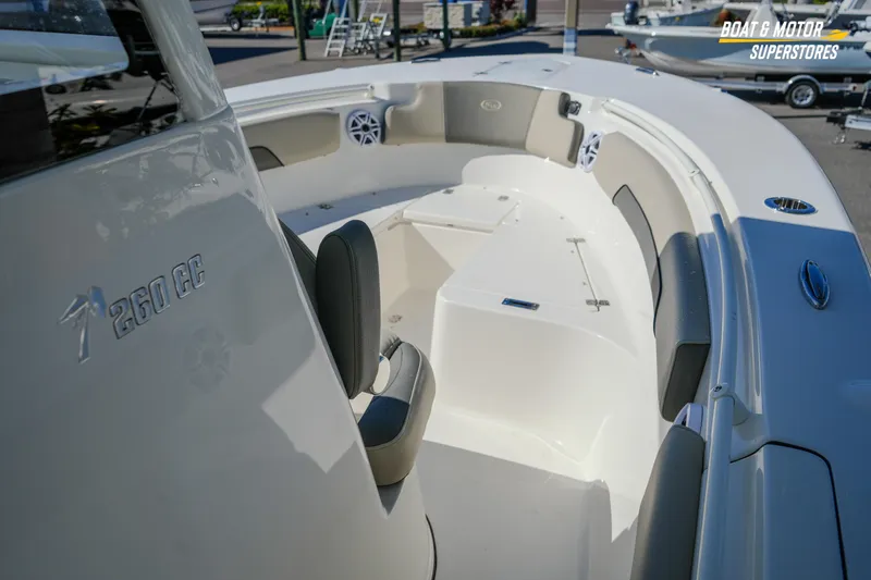 Slide: The Image of 2026 Key West 260 Center Console boat interior with seating and storage. - 54