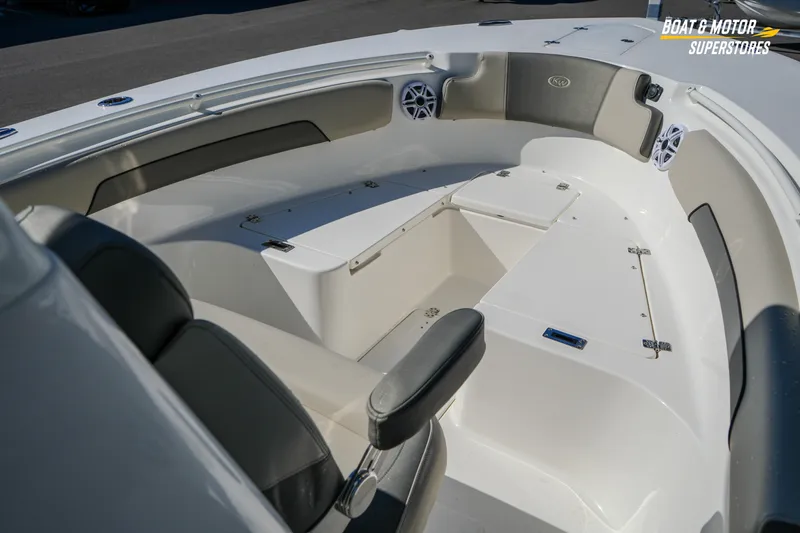 Slide: The Image of 2026 Key West 260 Center Console boat interior with seating and storage compartments. - 55