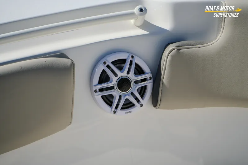 Slide: The Image of 2026 Key West 260 Center Console boat speaker and cushioned seating detail. - 57