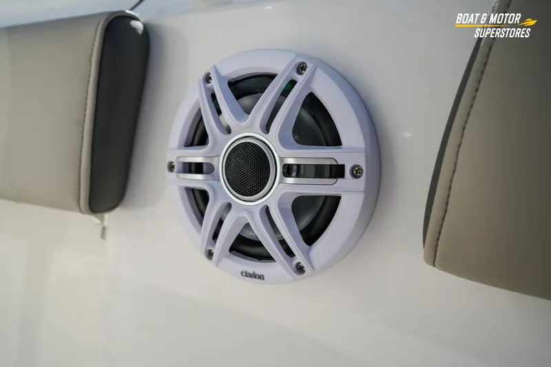Slide: The Image of Speaker on 2026 Key West 260 Center Console boat, featuring cushioned seating. - 59