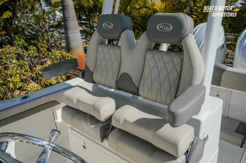 Slide: The Image of 2026 Key West 260 Center Console boat with luxurious seating and modern design. - 62