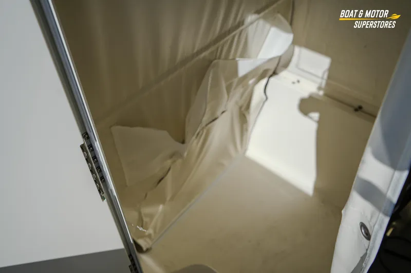 Slide: The Image of Interior view of 2026 Key West 260 Center Console boat storage compartment. - 66