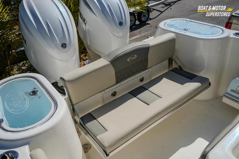 Slide: The Image of 2026 Key West 260 Center Console boat with dual Yamaha engines and comfortable seating. - 68