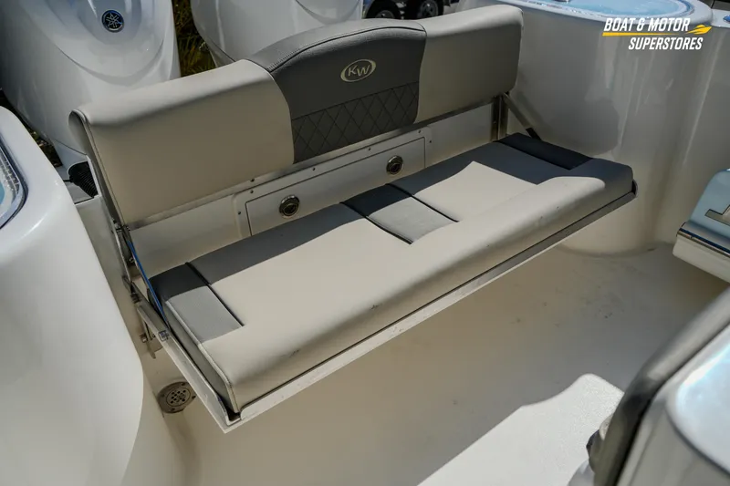 Slide: The Image of 2026 Key West 260 Center Console boat with foldable rear seating. - 69