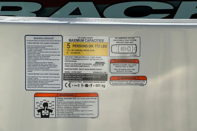 Slide: The Image of 2026 Mako Pro Skiff 15 CC capacity label detailing safety and operational warnings. - 23