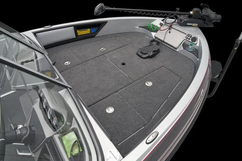 Slide: The Image of Interior of 2026 Ranger 1880MS boat with green seats and modern dashboard. - 15