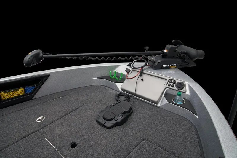 Slide: The Image of 2026 Ranger 1880MS boat interior with vibrant green seats and modern design. - 17