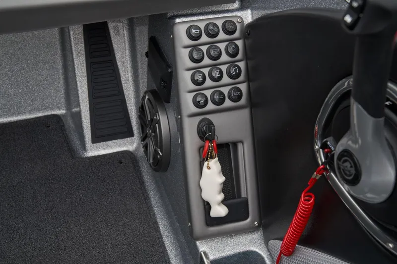 Slide: The Image of Open compartment in 2026 Ranger 1880MS boat showing internal components and wiring. - 38