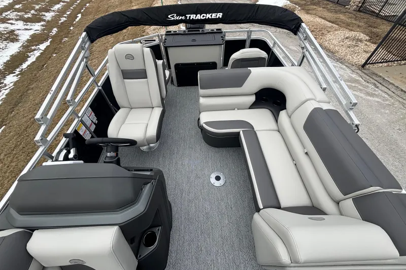 Slide: The Image of 2026 Sun Tracker Fishin' Barge 20 DLX pontoon boat with spacious seating and modern design. - 99
