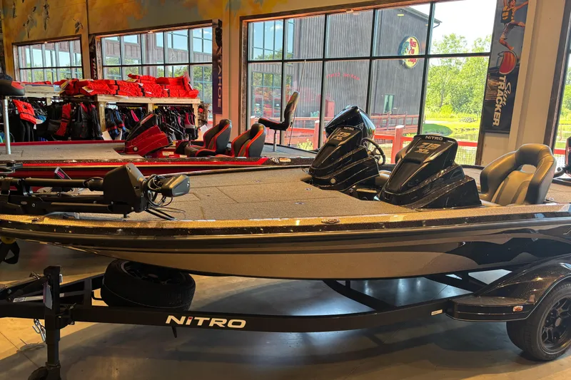The Image of 2026 Nitro Z19 XL Pro boat displayed indoors with accessories and equipment. - 0