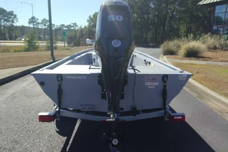Slide: The Image of 2026 Tracker Bass Tracker Classic CC boat with outboard motor on trailer. - 7