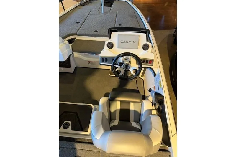 Slide: The Image of 2026 Nitro Z19 XL Pro boat cockpit with Garmin navigation system and comfortable seating. - 11