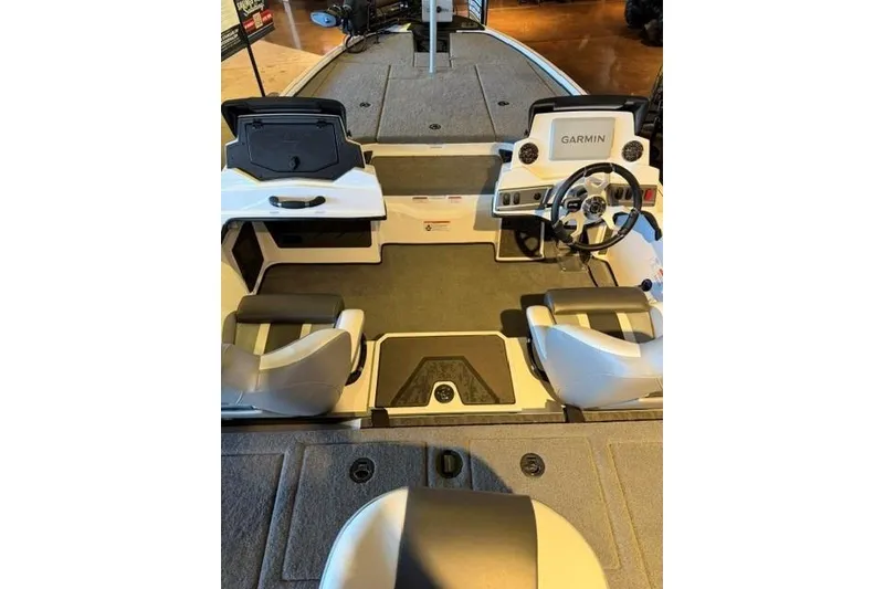 Slide: The Image of 2026 Nitro Z19 XL Pro boat interior with Garmin dashboard and seating. - 9