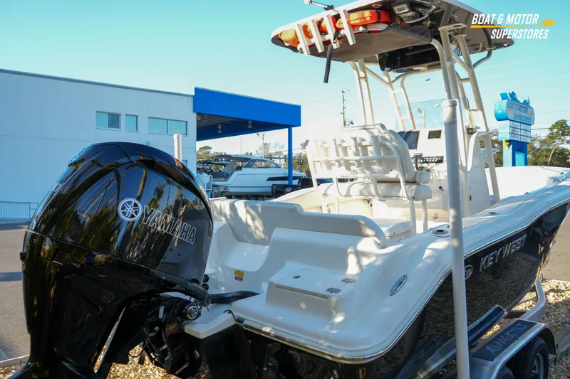 Slide: The Image of 2023 Key West 219 FS boat with Yamaha engine at dealership. - 12