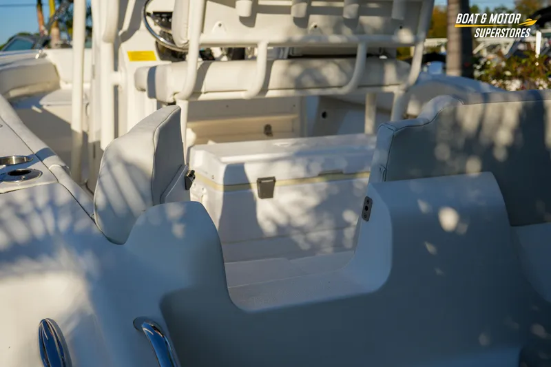 Slide: The Image of 2023 Key West 219 FS boat interior with seating and storage compartments. - 16