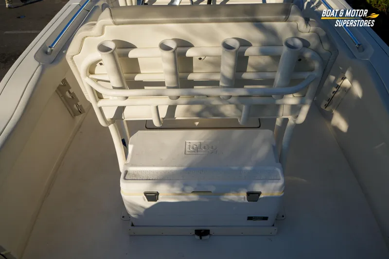 Slide: The Image of 2023 Key West 219 FS boat interior with rod holders and cooler. - 17