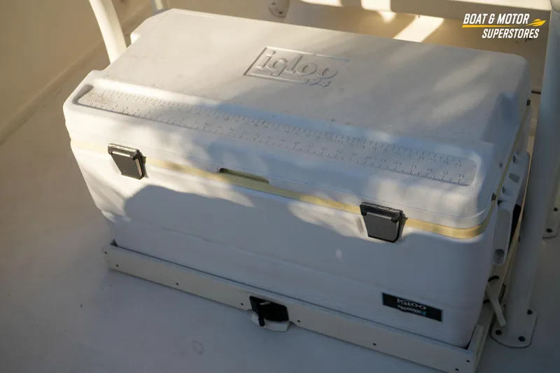Slide: The Image of White Igloo cooler on 2023 Key West 219 FS boat deck, with measuring scale on lid. - 19