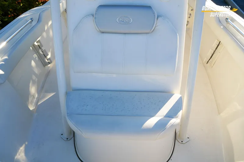 Slide: The Image of 2023 Key West 219 FS boat seat with white upholstery and KW logo. - 26
