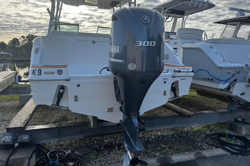 Slide: The Image of 2016 Robalo R247 Dual Console with Yamaha 300 engine on trailer. - 10