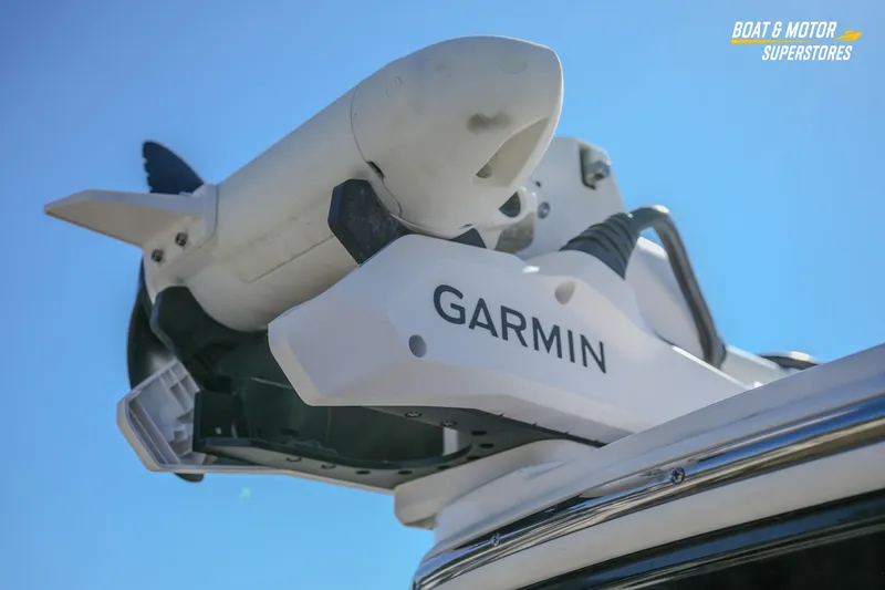 Slide: The Image of Garmin equipment on 2025 Blackfin 262 HB boat under clear blue sky. - 11