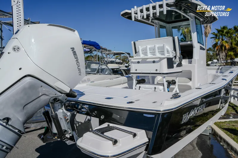 Slide: The Image of 2025 Blackfin 262 HB boat with Mercury engine, showcased at Boat & Motor Superstores. - 13