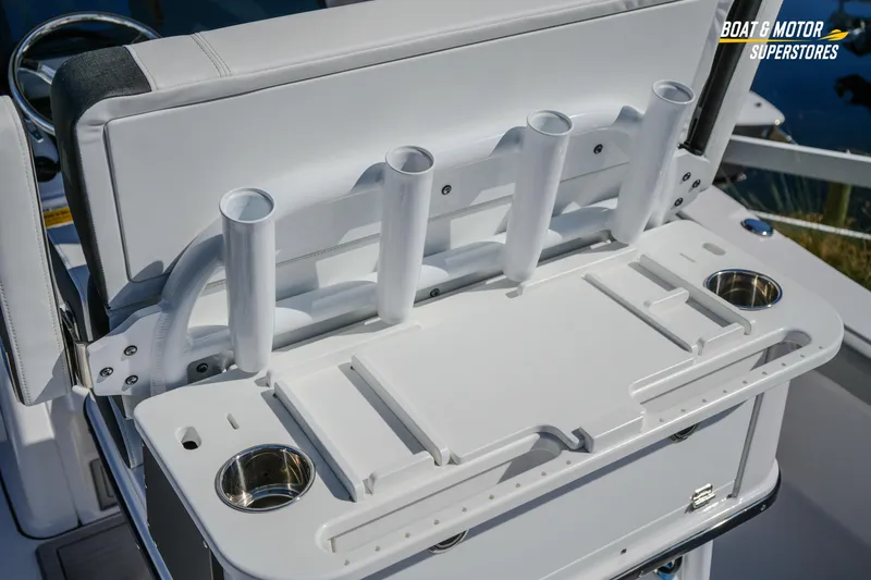 Slide: The Image of 2025 Blackfin 262 HB boat with rod holders and cup holders on deck. - 16