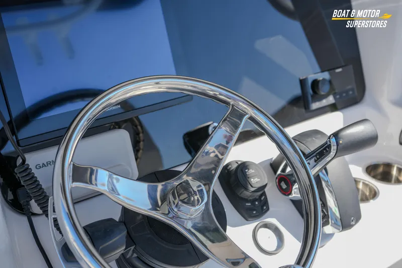 Slide: The Image of Steering console of 2025 Blackfin 262 HB boat with Garmin navigation system. - 22