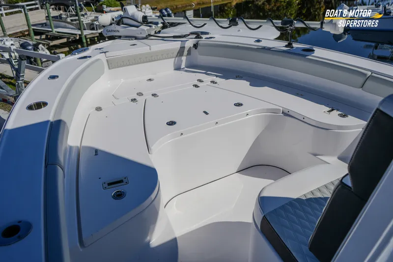 Slide: The Image of 2025 Blackfin 262 HB boat interior with seating and fishing equipment. - 24