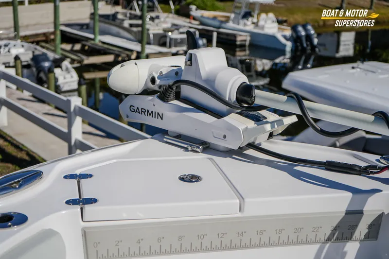 Slide: The Image of 2025 Blackfin 262 HB boat with Garmin equipment at a marina. - 25
