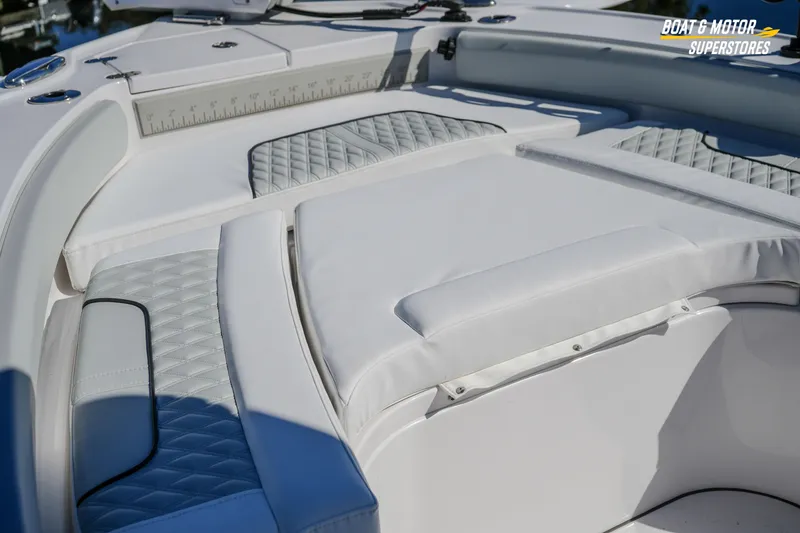 Slide: The Image of 2025 Blackfin 262 HB boat interior with cushioned seating and sleek design. - 37