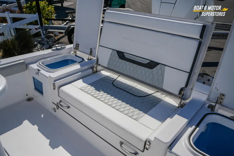 Slide: The Image of 2025 Blackfin 262 HB boat interior with cushioned seating and storage compartments. - 45