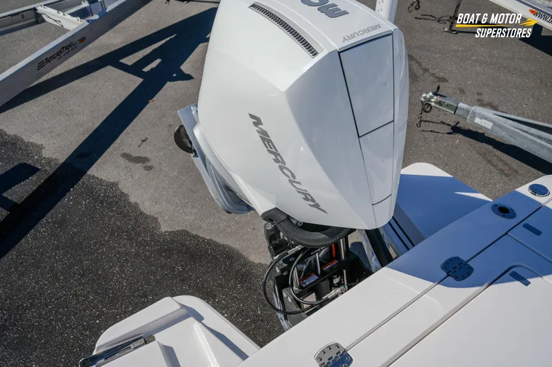 Slide: The Image of 2025 Blackfin 262 HB with Mercury outboard engine on trailer. - 47