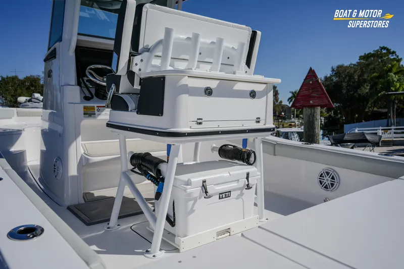Slide: The Image of 2025 Blackfin 262 HB boat interior with Yeti cooler and fishing equipment. - 7